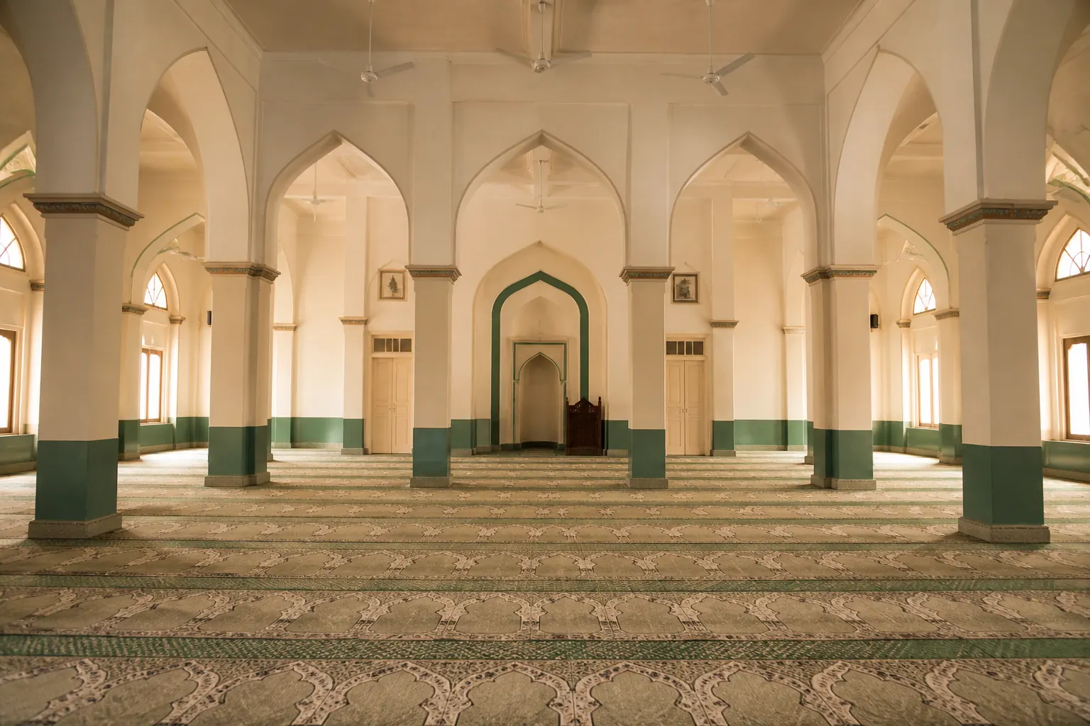 Interior of the college prayer hall with arched columns